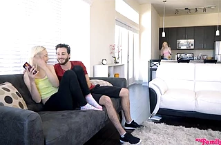 Sisters and their stepbro are on the couch having sex behind their parents’ back