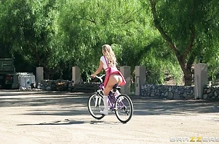 Sexy girl loves riding her bike modified with a dildo attached to her bike seat!