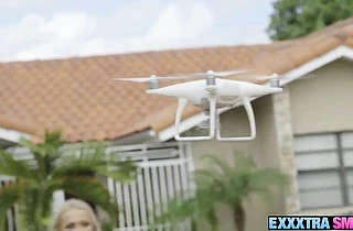 Her drone shows her how huge her neighbor’s cock is and she can’t resist it
