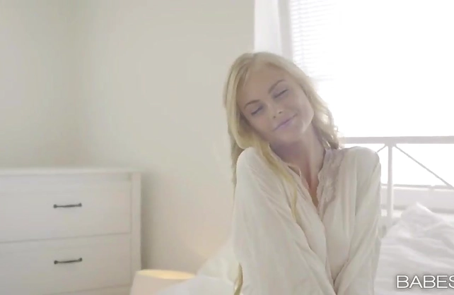 Beautiful naked girl wakes up feeling horny after a wet dream