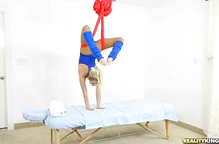 Naked girl gives an incredible inverted spinning blowjob and gets fucked on a swing