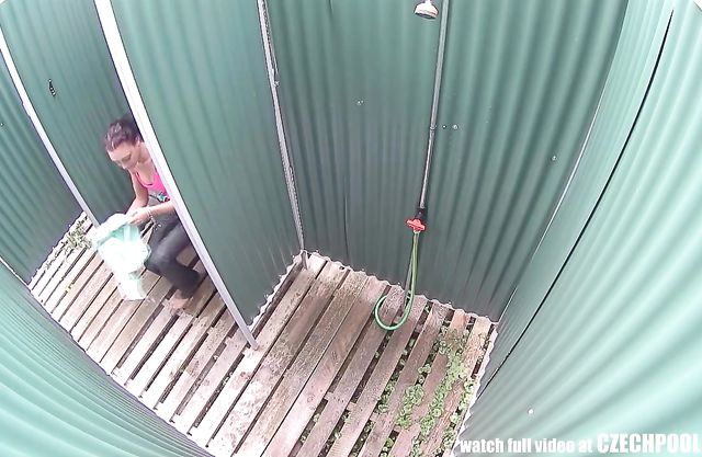 Watch this bitch in shower on the beach through a hidden cam