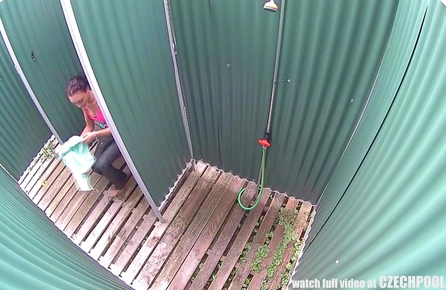 Watch this bitch in shower on the beach through a hidden cam
