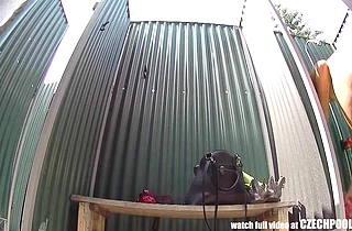 Watch this naked girl shower on the beach through a hidden camera