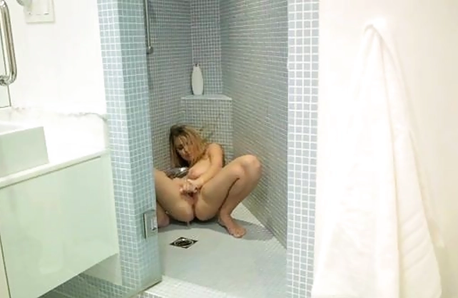 Slutty naked blonde teen enjoy spending solo time under shower