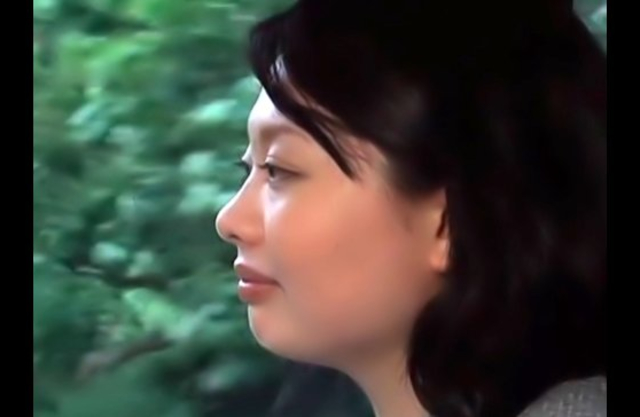 Busty Japanese seduced when taking a shower in the outdoor