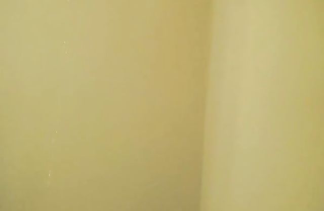 Amateur with big tits taped in the shower by horny step brother