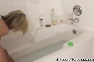 Alluring shower scenes with a hot amateur blonde shaving her legs