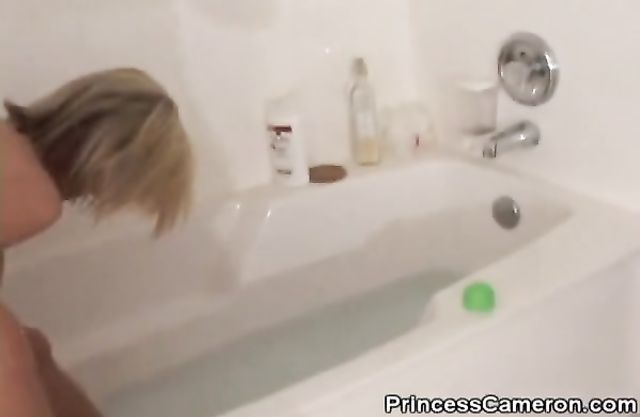Alluring shower scenes with a hot amateur blonde shaving her legs