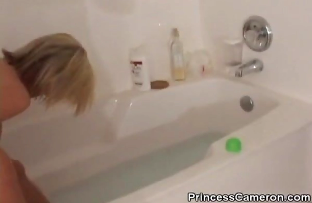 Alluring shower scenes with a hot amateur blonde shaving her legs