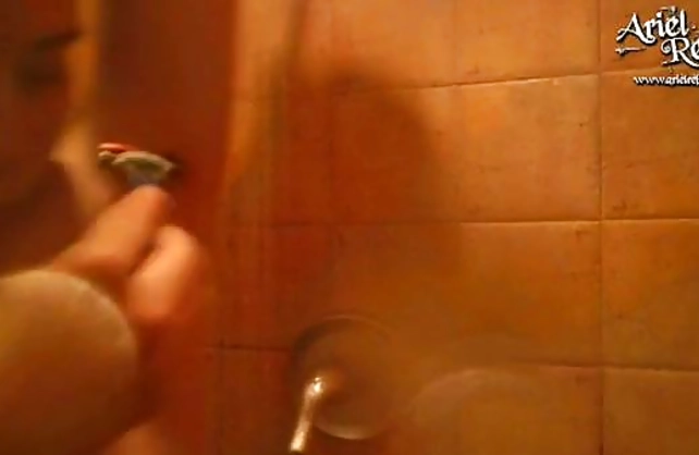 Nude amateur taped in the shower when playing with her kinky pussy