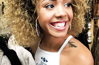 Black girl with curly hair and tiny naked tits deals with big white cock