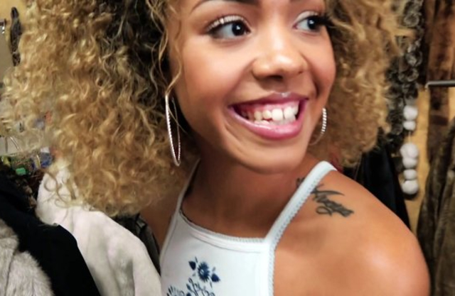 Black girl with curly hair and tiny naked tits deals with big white cock