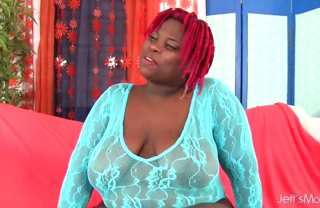 Black BBW woman relaxes solo by touching naked vagina with sex toys
