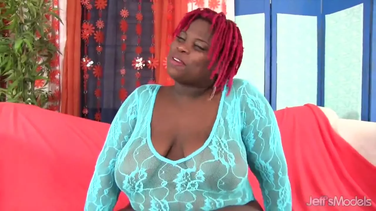 Black BBW woman relaxes solo by touching naked