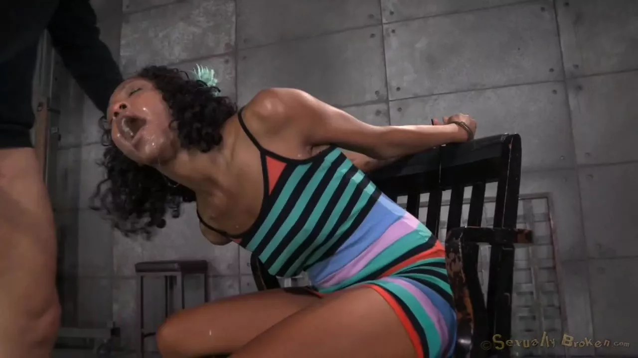 Tied up ebony bitch is forced to suck cock