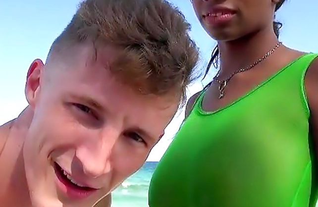Chubby ebony woman with big tits grinds on a cock in interracial sex action