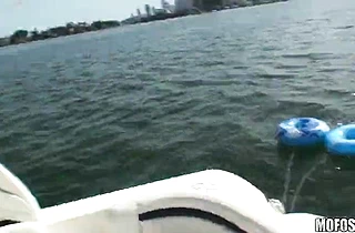 Black and white chicks spend a good time having naked sex on the boat
