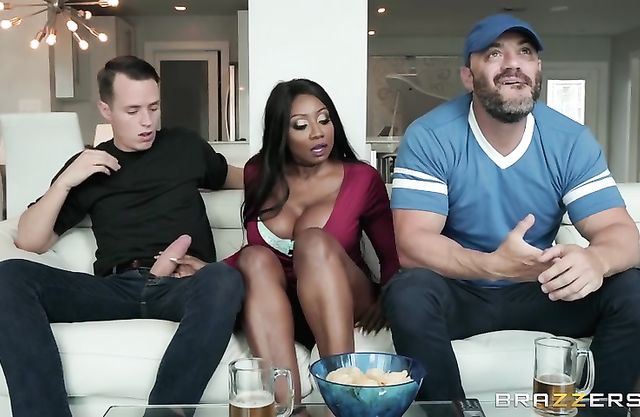 When passion seizes black girl's mind, she sucks naked cock next to husband
