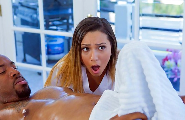Massage girl notices bulge of naked Ebony client and wants to suck it