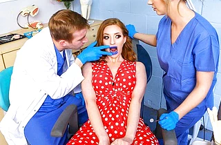 Redhead in polka-dot dress does it with naked huge dick of dentist