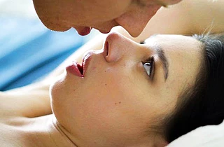 Pale-skinned brunette and her BF unhurriedly copulate naked in bed