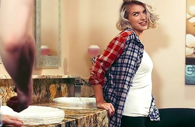Enticing blonde tempts handsome stranger into naked sex in toilet