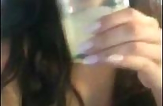 Amateur brunette girl flashes naked tits while flirting with fans