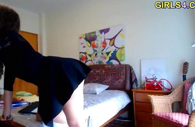 Beautiful girl with amazing legs shows off her sexy body in front of the camera