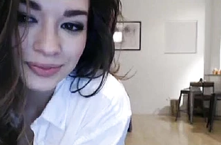 Playful angel poses naked for the camera masturbating pussy with a big sex toy