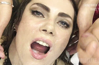 Excited guys surround naked chick and ejaculate in her open mouth