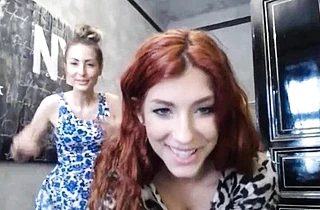 Sexy naked girl with red hair enjoys cock riding in webcam video