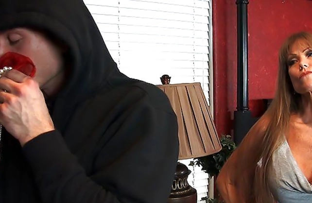 Mature woman catches burglar and forces to satisfy her naked needs