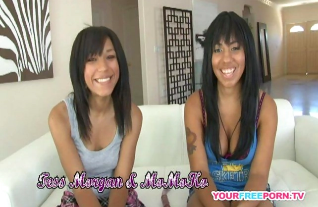 Joyful black girls lick and toy each other's naked twat in living room