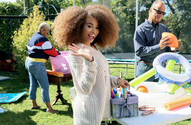I noticed that this ebony teen isn’t just selling her possessions at this yard sale