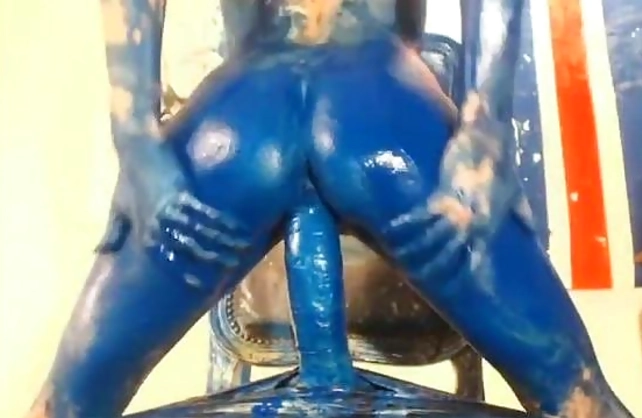 Slender painter dyed skin in blue and impaled muff on naked cock