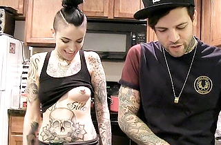 Brunette naked girl with navel piercing exposes beautiful body