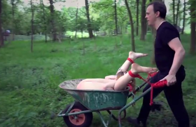 Creepy man dominates over naked cutie by spanking her in basement