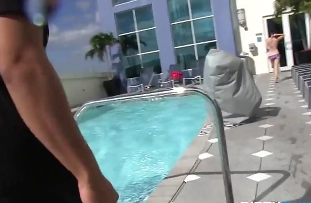 Naked brunette fucked hard after tanning in a cute swimsuit by the pool