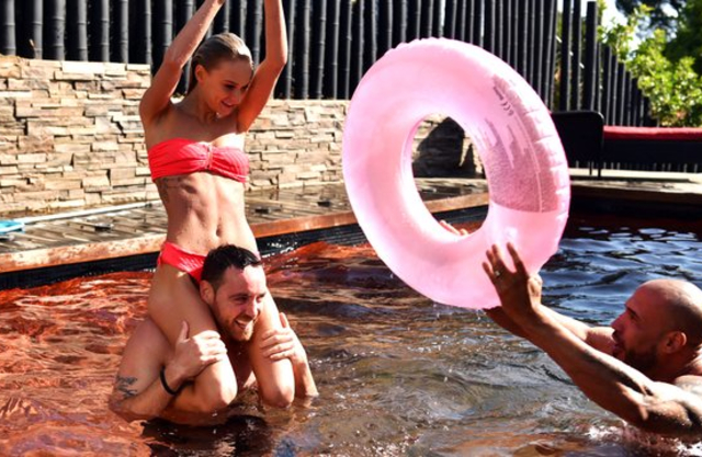 Two hung men team up to satisfy one beautiful and tiny naked girl