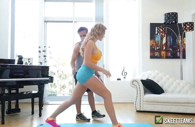 Naked girl does it with a young man who interrupts her sexy workout