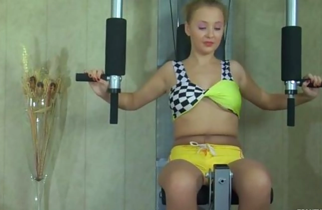 Russian naked girl wears sexy pantyhose and heads to the gym to work out
