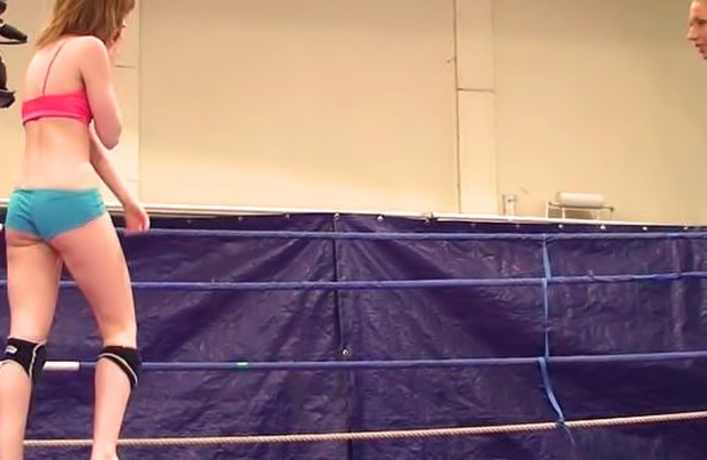 Two slutty naked girls fight in the ring and slowly get naked for hot sex