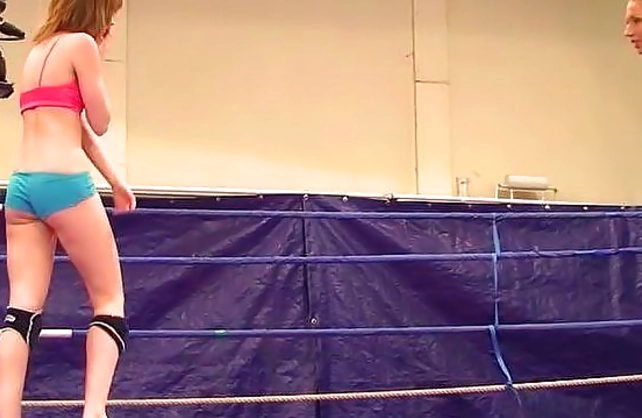 Two slutty naked girls fight in the ring and slowly get naked for hot sex