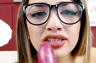 Nerdy camgirl with beautiful naked body masturbates and sucks dildo