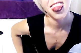 Milfy blonde with short hair sucks dildo in the non-naked video