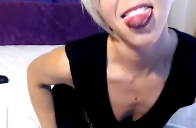 Milfy blonde with short hair sucks dildo in the non-naked video