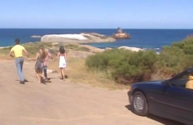 Two men and naked wantons receive pleasure from outdoor foursome