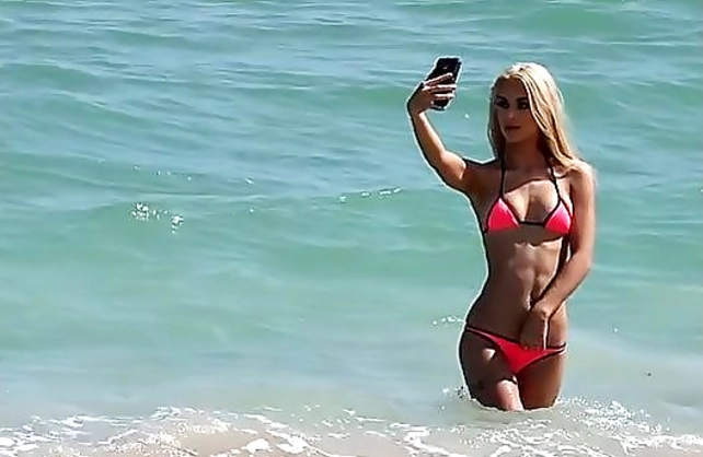 Stranger fucks the naked blonde with beautiful tanned body on the bed