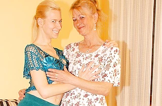 Sexy girlfriends of different age with skinny naked bodies lick each other